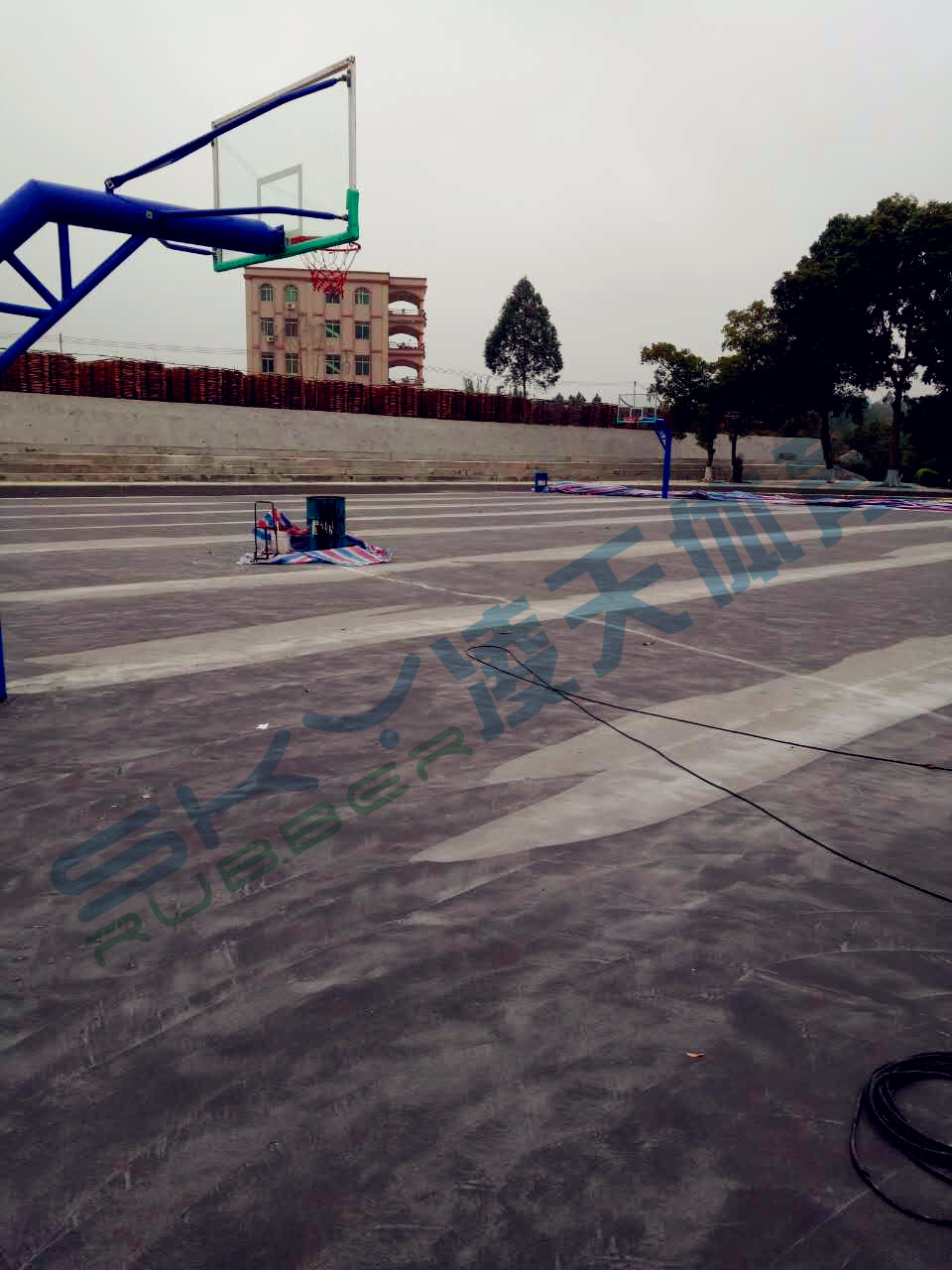 丙烯酸蓝球场案例：江门市鹤山宅梧小学弹性丙